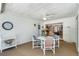 Screened lanai with dining table and access to the interior at 420 Wild Oak Cir, Longwood, FL 32779