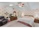 Comfortable main bedroom with sitting area, ample closet space, and natural light at 420 Wild Oak Cir, Longwood, FL 32779