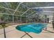 Relaxing backyard featuring a screened in pool and patio area at 420 Wild Oak Cir, Longwood, FL 32779