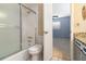 Bathroom view, looking from the bedroom, with shower, tub, and vanity at 4231 Yorketowne Rd, Orlando, FL 32812