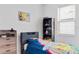 Cozy bedroom with natural light, a neutral color palette, and playful decor at 4316 Carrabelle River Ln, Lakeland, FL 33811