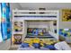 Fun bedroom with bunk beds, Minions-themed decor and playful accents at 4500 Alberto Cir, Kissimmee, FL 34746