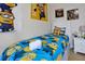 Delightful bedroom with Minions-themed decor and a cozy, inviting bed at 4500 Alberto Cir, Kissimmee, FL 34746
