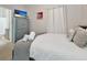 Charming bedroom with neutral tones, a TV, and an attached bathroom for added convenience at 4500 Alberto Cir, Kissimmee, FL 34746