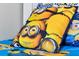 Whimsical bedroom decor featuring Minions-themed bedding and pillow at 4500 Alberto Cir, Kissimmee, FL 34746