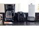 Close up of countertop showing a coffee maker, toaster, and paper towel holder at 4500 Alberto Cir, Kissimmee, FL 34746