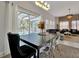 Open-concept dining and living room with pool views, great for entertaining at 4500 Alberto Cir, Kissimmee, FL 34746