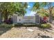 The community entrance sign features lush landscaping and a welcoming design at 482 Captiva Dr, Davenport, FL 33836