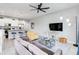 Inviting living area showcasing a modern design with views to the kitchen and dining areas at 482 Captiva Dr, Davenport, FL 33836