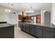 Spacious kitchen featuring granite counters, stainless appliances, and an open layout at 5335 Coral Vine Ln, Kissimmee, FL 34758