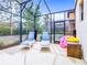 Private screened in pool with lounge chairs to enjoy relaxing outside at 5412 Solterra Cir, Davenport, FL 33837
