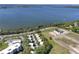 Beautiful lakefront condo aerial view of a waterfront property in a desirable location near new construction at 601 W Old Us Highway 441 # 9B, Mount Dora, FL 32757