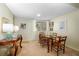 Cozy dining room featuring classic furniture and soft lighting, perfect for Gathering meals at 601 W Old Us Highway 441 # 9B, Mount Dora, FL 32757