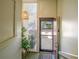 Bright foyer with a large window, stylish light fixture, and a welcoming entrance at 601 W Old Us Highway 441 # 9B, Mount Dora, FL 32757