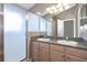 Bathroom with dual sinks and spacious shower at 6274 Bristol Channel Way, Orlando, FL 32829