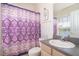 Bathroom featuring a colorful patterned shower curtain at 6274 Bristol Channel Way, Orlando, FL 32829