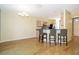 Open concept kitchen featuring a breakfast bar and modern appliances at 6274 Bristol Channel Way, Orlando, FL 32829