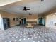 Resident lounge featuring neutral tones, ceiling fans and bench seating on a tiled floor at 6274 Bristol Channel Way, Orlando, FL 32829