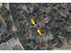 Aerial view of townhome community surrounded by green trees and community parking at 6364 Raleigh St # 1615, Orlando, FL 32835