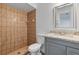 Bathroom features tiled shower stall with granite vanity and tiled backsplash at 6713 Cherry Rd, Ocala, FL 34472