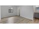Bedroom with light wood floors, neutral walls, window for natural light, and closet for storage at 6713 Cherry Rd, Ocala, FL 34472