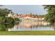 Elegant clubhouse overlooking a serene lake, offering a luxurious and picturesque setting at 801 San Raphael St, Poinciana, FL 34759