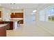 Well-lit kitchen boasts stainless steel appliances and granite countertops at 801 San Raphael St, Poinciana, FL 34759