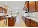 Spacious kitchen features granite countertops and stainless steel appliances at 801 San Raphael St, Poinciana, FL 34759
