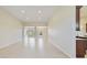 Bright and open living room featuring tile floors and recessed lighting, creating an inviting atmosphere at 801 San Raphael St, Poinciana, FL 34759