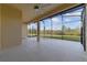 Expansive screened patio offering an inviting outdoor living space with views of the lush surroundings at 801 San Raphael St, Poinciana, FL 34759