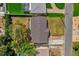 This aerial view shows the home's roof and proximity to the street at 822 Oakview Dr, New Smyrna Beach, FL 32169