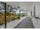 Outdoor patio featuring a white ceiling and beautiful landscaping at 822 Oakview Dr, New Smyrna Beach, FL 32169