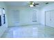 Bright and airy bedroom features marble floors, neutral walls, and large windows for ample natural light at 871 Blairmont Ln, Lake Mary, FL 32746