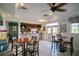 Cozy bar area with tables and chairs, offering a relaxed space for socializing and enjoying refreshments at 7404 Oconee St, Reunion, FL 34747
