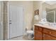 Bathroom featuring a walk-in shower and a single sink at 7404 Oconee St, Reunion, FL 34747