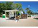 Food truck featuring a custom wrap, outside dining, an awning, and located near the pool at 7404 Oconee St, Reunion, FL 34747