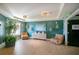 Inviting lobby area featuring tufted chairs, decorative lighting, and stylish decor in a relaxing atmosphere at 7404 Oconee St, Reunion, FL 34747