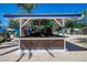 Outdoor bar serving drinks and snacks by the pool, perfect for relaxing and socializing at 7404 Oconee St, Reunion, FL 34747