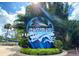 The Seaworld Sign entrance with surrounding foliage, lush greenery, and greenery at 7404 Oconee St, Reunion, FL 34747