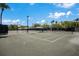 Well-maintained tennis courts featuring professional surfacing and ample lighting for evening play at 7404 Oconee St, Reunion, FL 34747