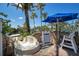 Fun water slide area with lifeguard station and shaded seating for relaxing by the pool at 7404 Oconee St, Reunion, FL 34747