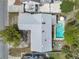 Aerial view of the house showcasing the backyard pool and surrounding neighborhood at 2829 Aloma Ave, Winter Park, FL 32792