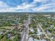 Wide aerial view of a residential area showcasing the landscape, houses, and community at 2829 Aloma Ave, Winter Park, FL 32792