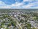 Picturesque aerial view displays the network of streets, homes, and lush landscaping in a well-established community at 2829 Aloma Ave, Winter Park, FL 32792
