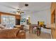 Cozy living room featuring a fireplace, wood floors, and a relaxed atmosphere at 2829 Aloma Ave, Winter Park, FL 32792