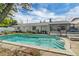 Refreshing pool with steps for easy access, surrounded by a patio and backyard at 2829 Aloma Ave, Winter Park, FL 32792