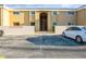 Condo building featuring designated parking, painted in inviting warm colors, and a welcoming entrance at 1000 Lake Of The Woods Blvd # 103H, Casselberry, FL 32730