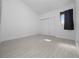 This bedroom is light and bright with modern floors and ample closet space with sliding doors at 1092 E Michigan St # 1, Orlando, FL 32806