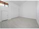 This bedroom is light and bright with modern floors and ample closet space with sliding doors at 1092 E Michigan St # 1, Orlando, FL 32806