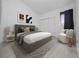 Comfortable bedroom with neutral decor, stylish furnishings, and plenty of natural light at 1092 E Michigan St # 1, Orlando, FL 32806